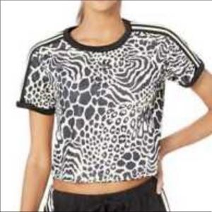 Adidas NWT three striped t-shirt. Never worn. Price tag fell off. Ideal gift.